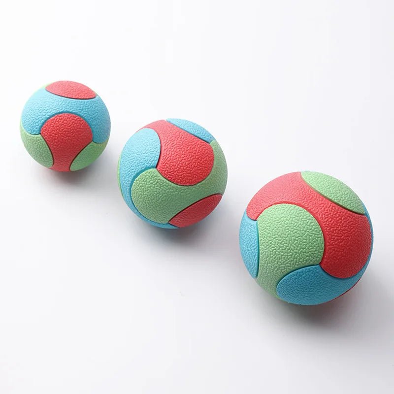 Collection of colorful durable interactive dog chew ball toys for teeth cleaning and engaging playtime.