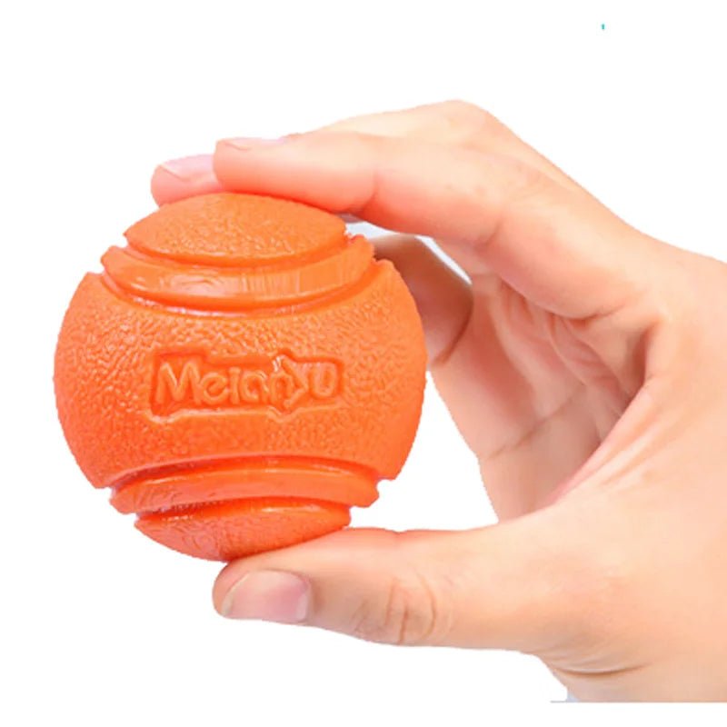 Bouncy blue rubber dog chew ball, an interactive dental toy for healthy teeth and active dog play.