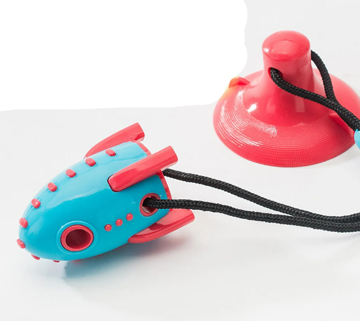 Pet supplies: red rocket dog chew toy, durable for aggressive chewers, enhances playtime.