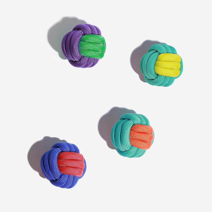 Assortment of dog knots ball pet toys in various colors, ideal for strong chewers