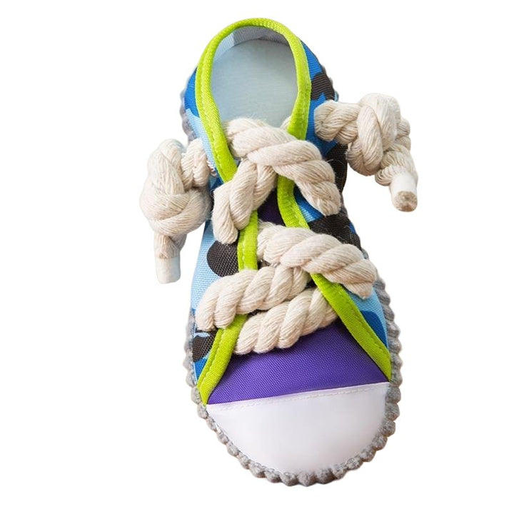 Durable squeaky rubber shoe toy for small to medium dog breeds, interactive pet playtime.