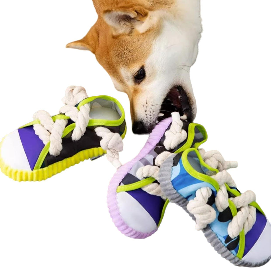 Small dog chew toy: a yellow rubber shoe with squeaker, perfect for interactive playtime.