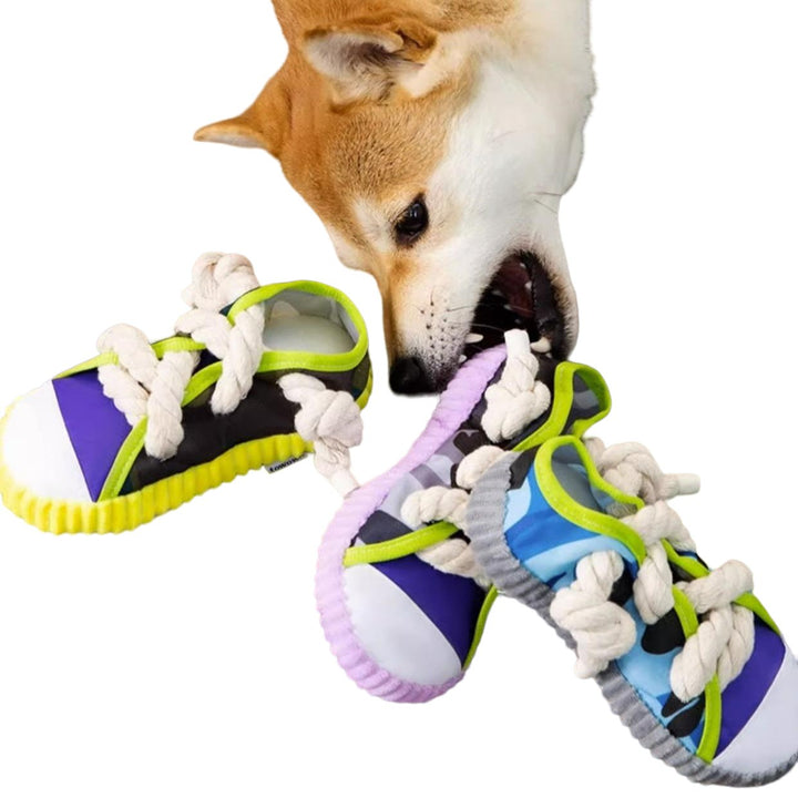 Small dog chew toy: a yellow rubber shoe with squeaker, perfect for interactive playtime.