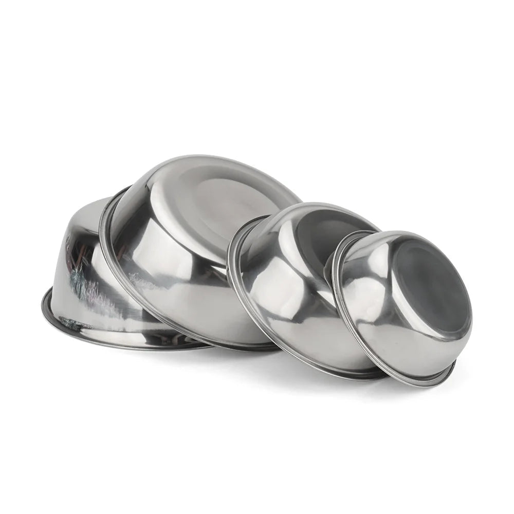 Shiny stainless steel pet bowl for food or water, an essential item for dog and cat owners.