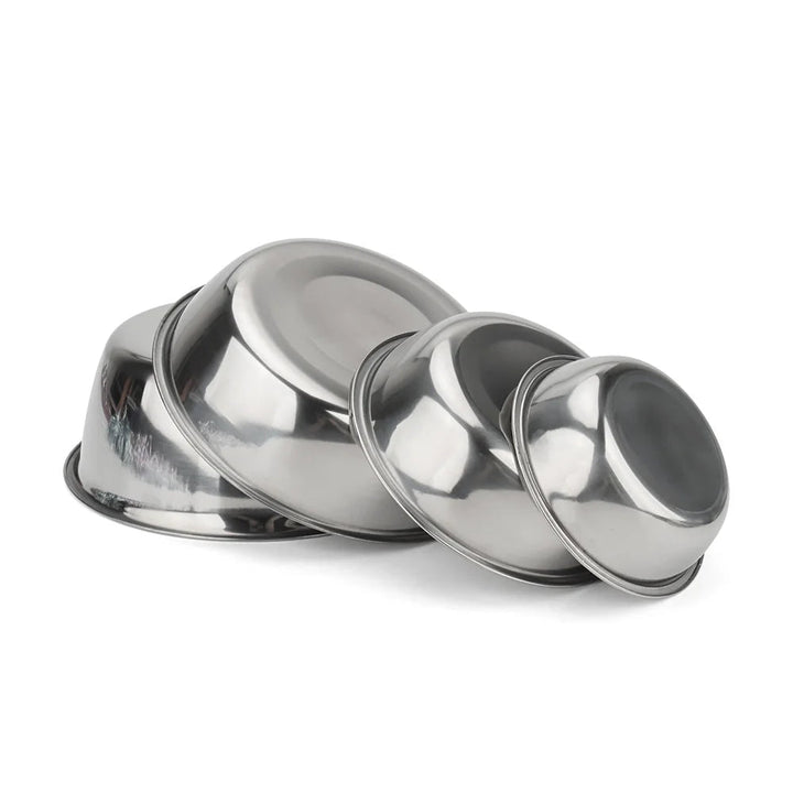Shiny stainless steel pet bowl for food or water, an essential item for dog and cat owners.