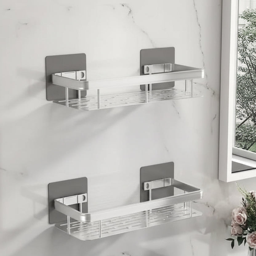 Durable stainless steel adhesive bathroom shelf, drill-free shower caddy for lasting modern bathroom storage.