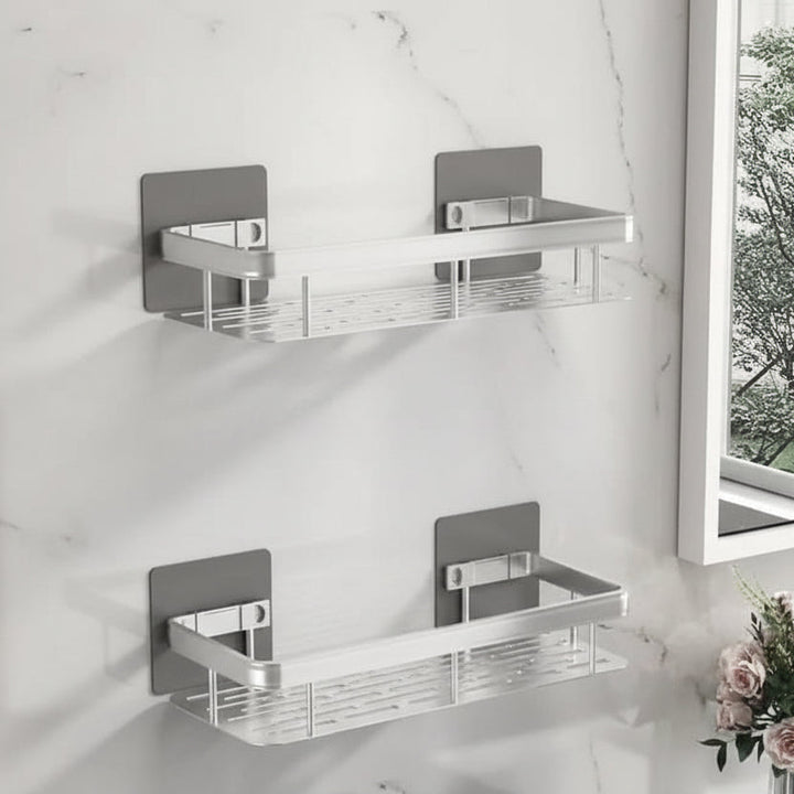 Durable stainless steel adhesive bathroom shelf, drill-free shower caddy for lasting modern bathroom storage.