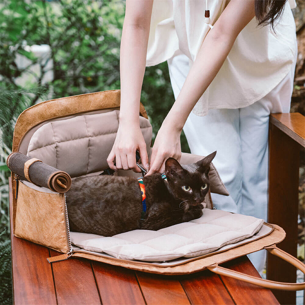 Airline approved pet travel bag with soft fleece bed, expandable sides for comfort