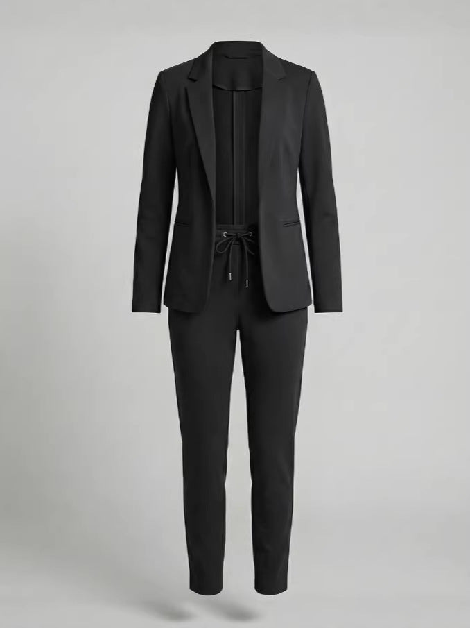Versatile women's two-piece pant suit set. Chic tailored blazer & pants for work, business, or casual outfits.