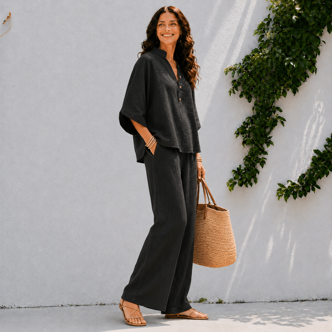 Women's effortless matching two-piece set in a relaxed fit. Includes an oversized top & chic wide-leg trousers.