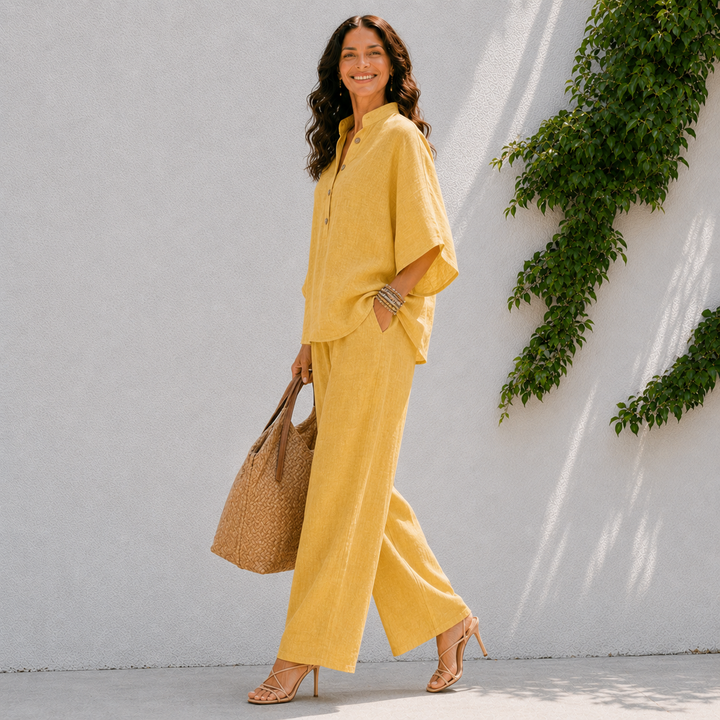 Trendy women's co-ord set: oversized button blouse & wide-leg pants for a relaxed, casual chic vacation look.