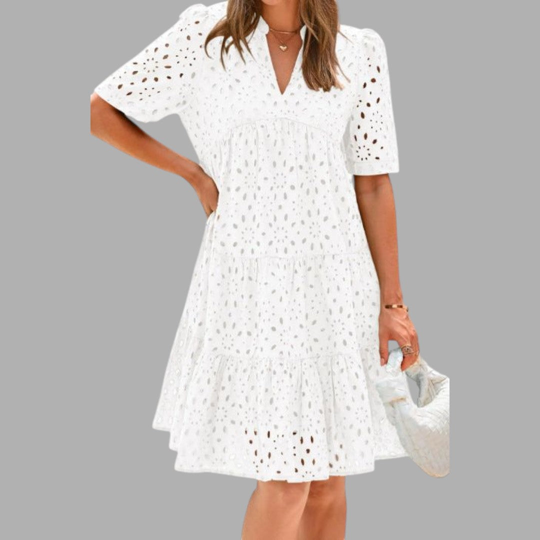 Effortless women's casual mini dress, perfect for everyday wear. Short sleeve, relaxed fit, comfortable summer style.