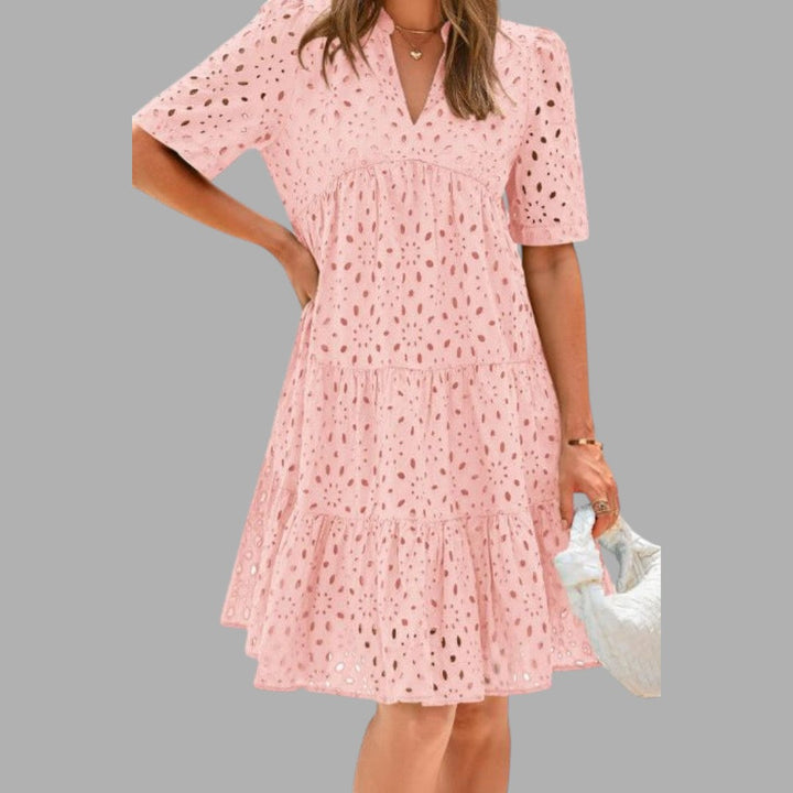 Simple & stylish women's mini dress. Effortless casual wear with short sleeves, ideal for everyday summer fashion.