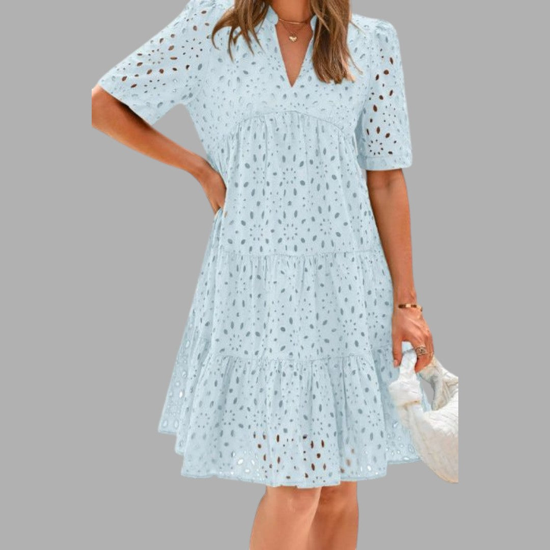 Versatile women's casual mini dress, a short sleeve design with a relaxed fit for effortless everyday summer style.
