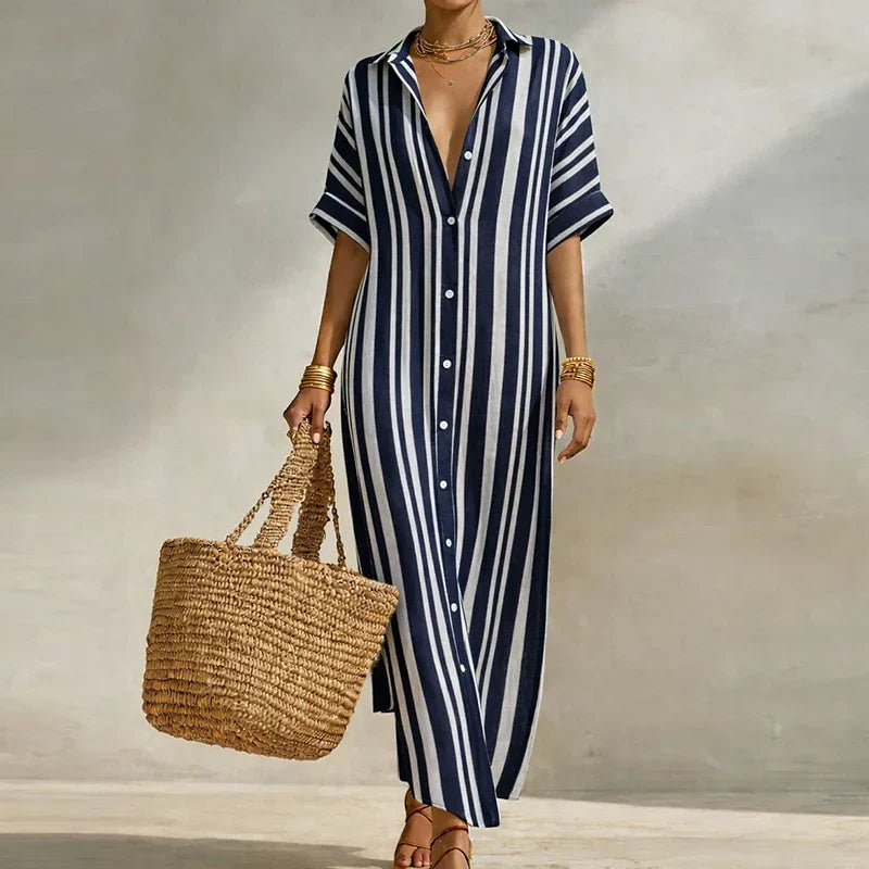 Flowy women's striped long shirt dress with three-quarter sleeves, ideal for a casual summer look.