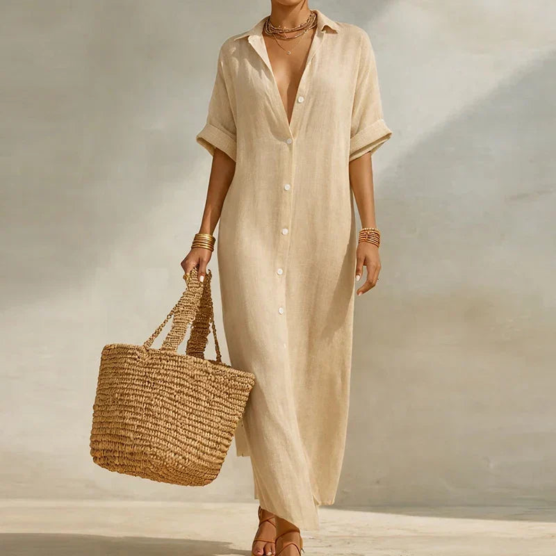 Chic women's striped long shirt dress with three-quarter sleeves, perfect for stylish summer casual wear.