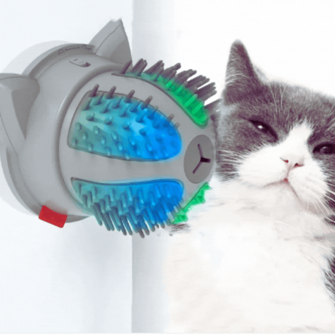 Close-up of electric cat groomer, self-massager with catnip pouch, showing dual power plug & rotating brush