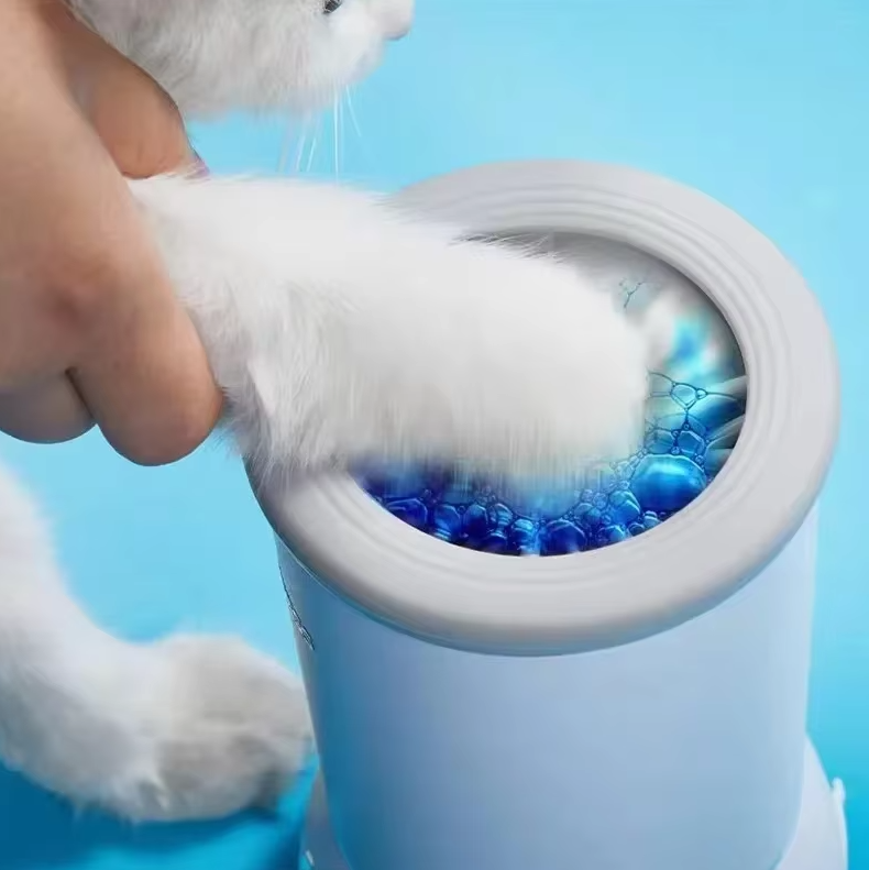 Close-up of electric dog paw cleaner showing interior soft bristles for gentle deep cleaning