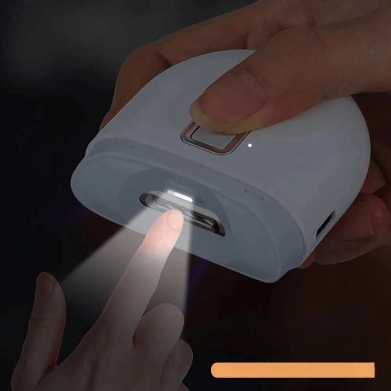 Portable electric nail grooming tool, ideal for easy personal care & professional home spa treatments.