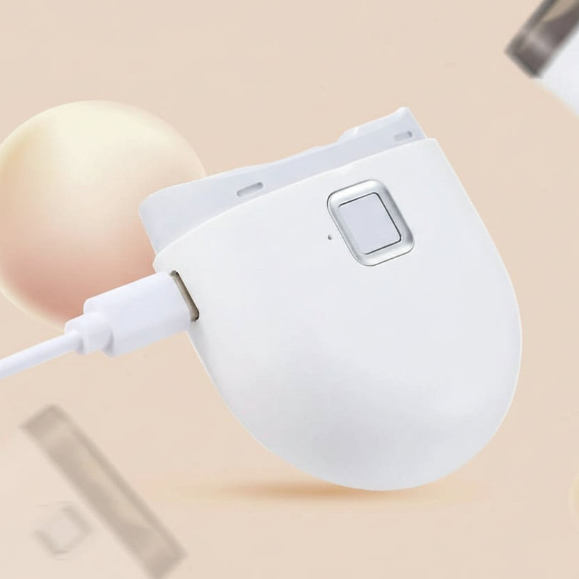 Ergonomic electric manicure tool with various attachments for complete, professional nail care & grooming.