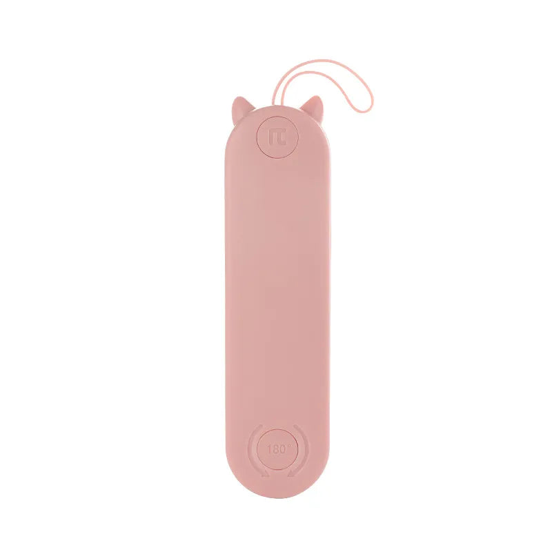 Electric pet detangling brush, compact and lightweight, for effective cat and dog grooming.