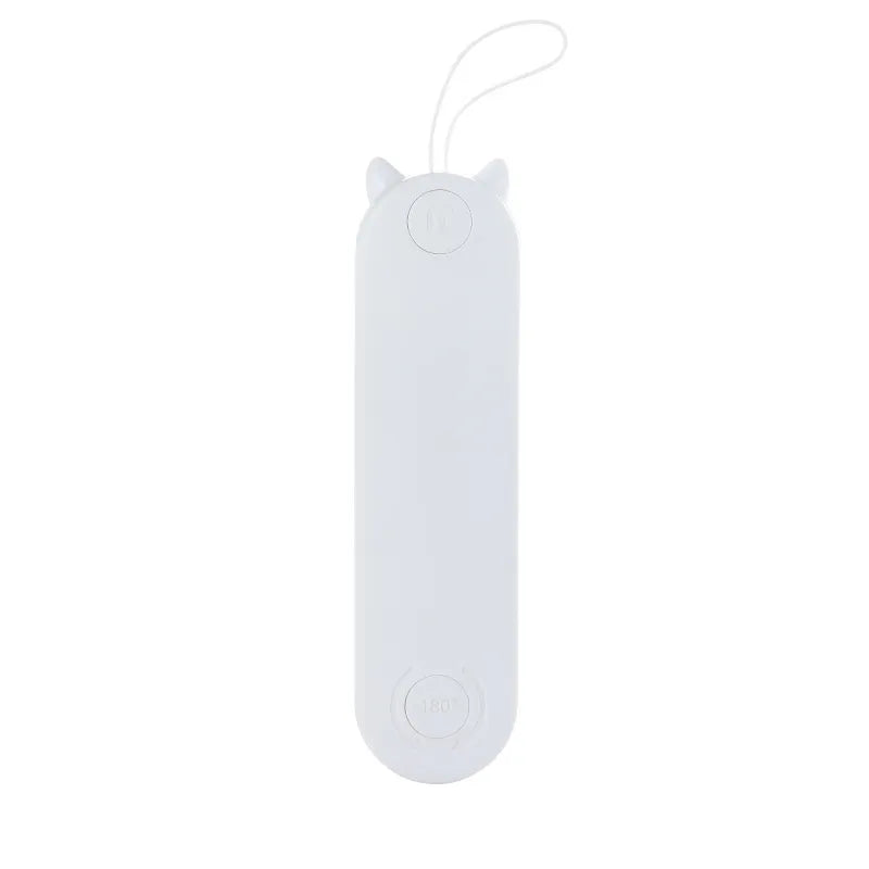 Electric pet grooming brush with soft detangling bristles, suitable for sensitive skin on cats and dogs.