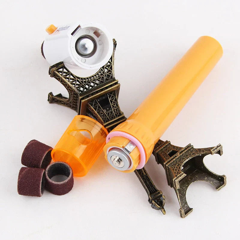 Quiet electric pet nail grinder used on a dog's paw, demonstrating safe and effective grooming tool