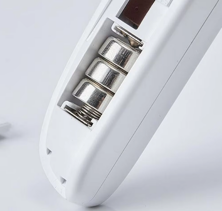 Assortment of electronic pet nail trimmers for feline and canine paw care, displaying various colors.