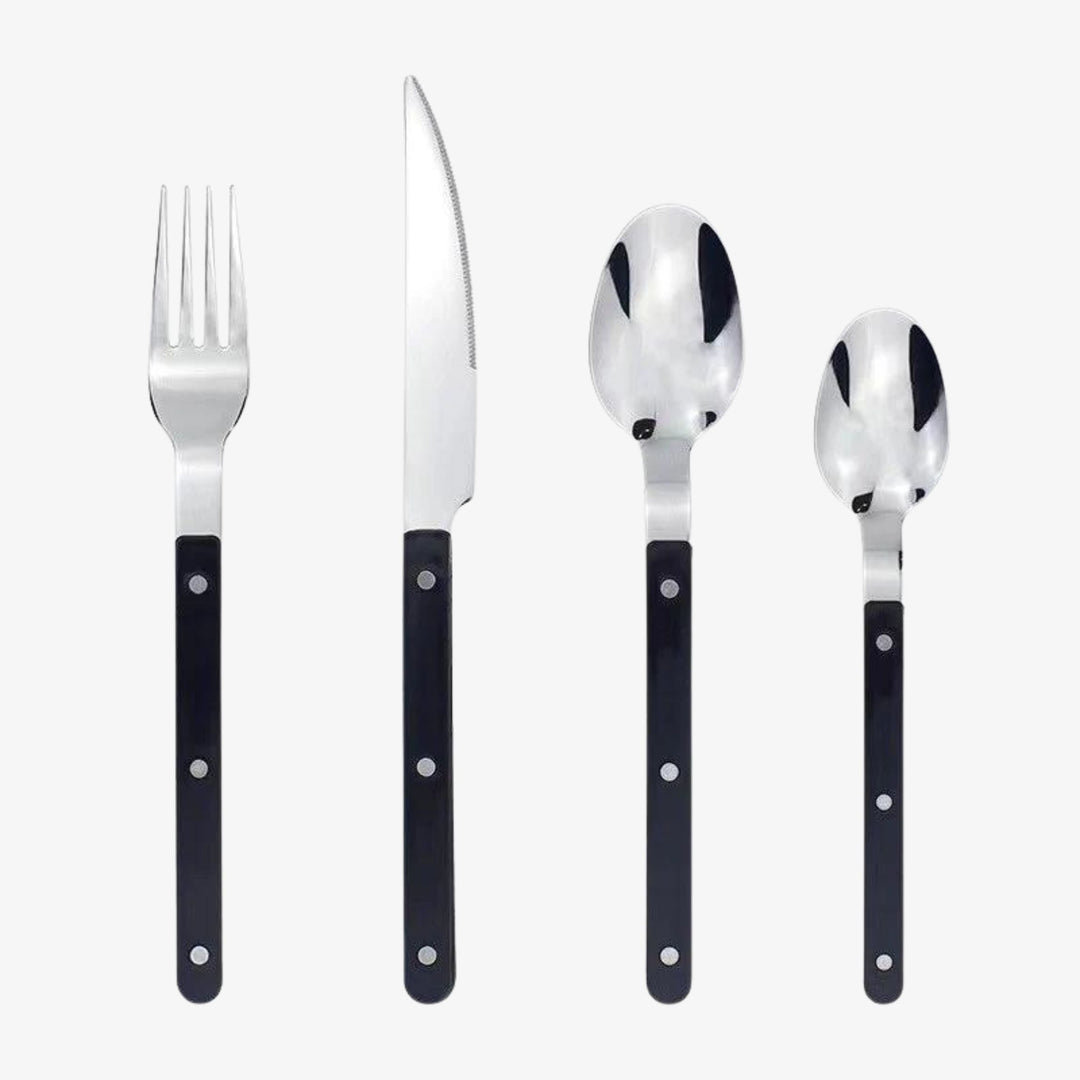 Elegant 24-piece engraved stainless steel cutlery set. Premium flatware for dining, perfect tableware for any meal.