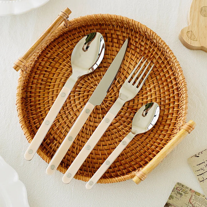 Luxury 24-piece engraved stainless steel dinnerware set. Premium flatware, a perfect gift for an elegant dining table.