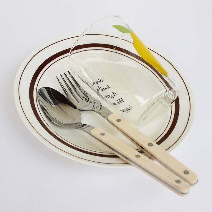 Chic 24-piece engraved stainless steel dinnerware set. Premium flatware, perfect dining cutlery for entertaining guests.