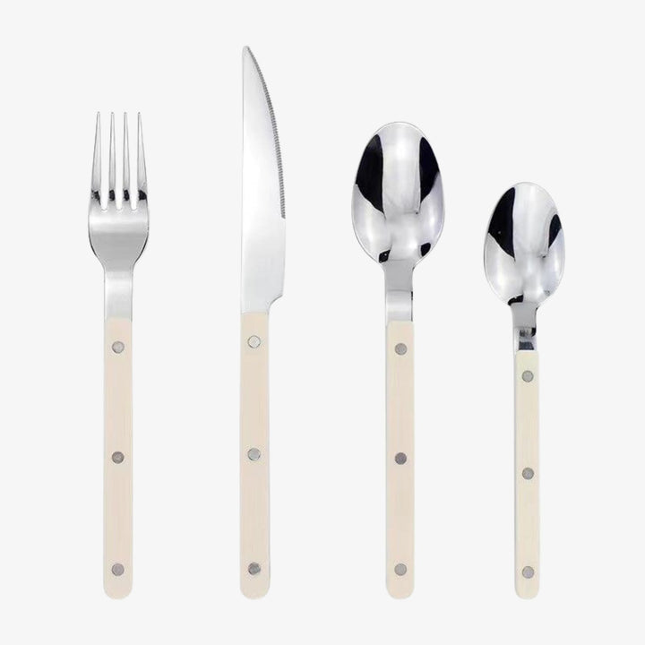 Versatile 24-piece engraved stainless steel cutlery set. High-quality dining flatware, essential kitchenware gift.