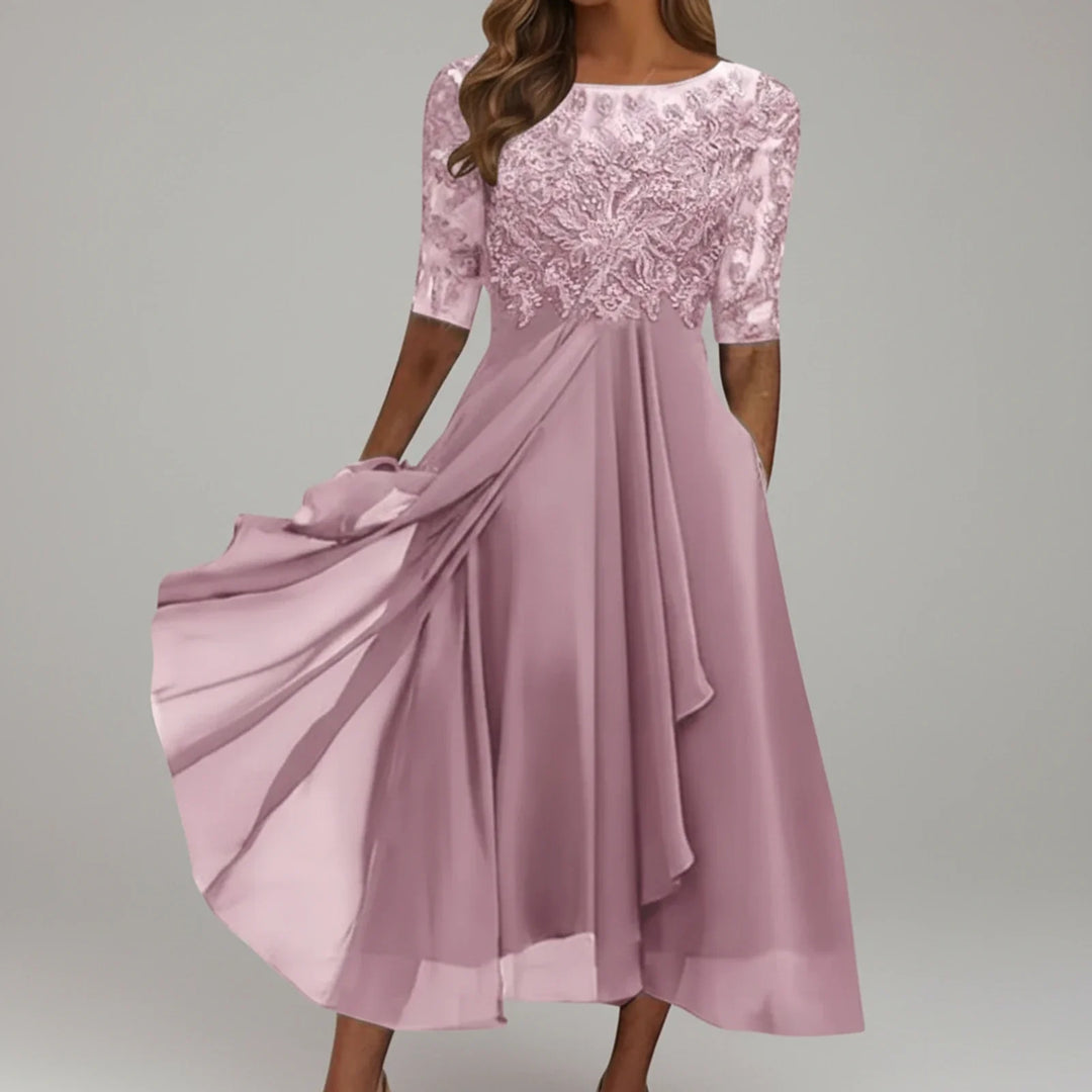 Women's versatile midi A-line dress with 3/4 sleeves, empire waist, and pockets, ideal for elegant events.