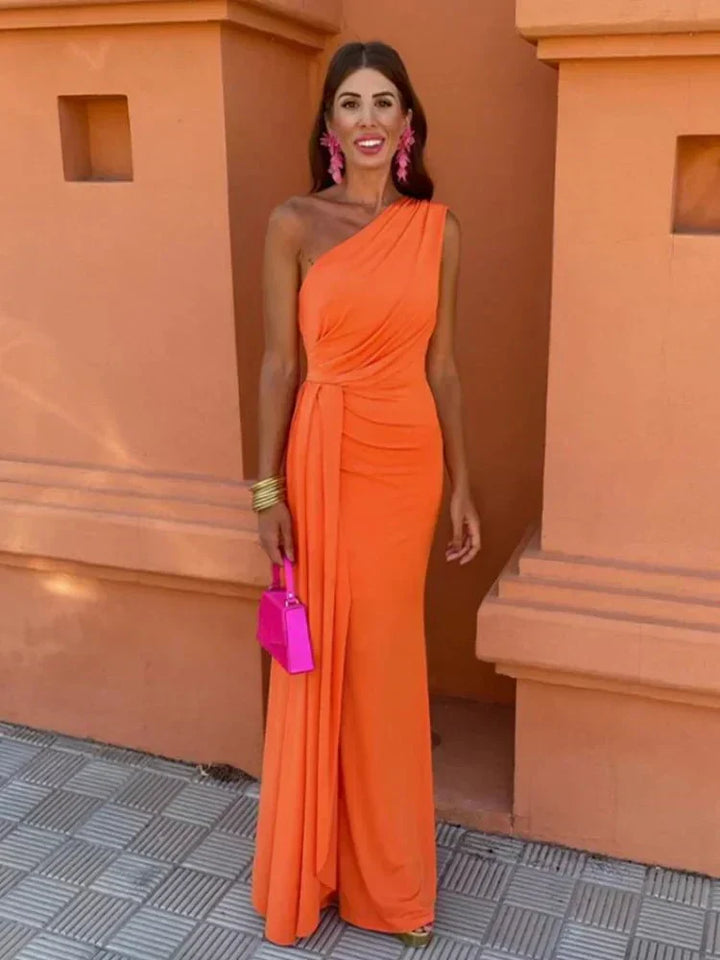 Elegant A-line wedding guest dress for women, sleeveless and flattering. Perfect for special occasions & formal parties.