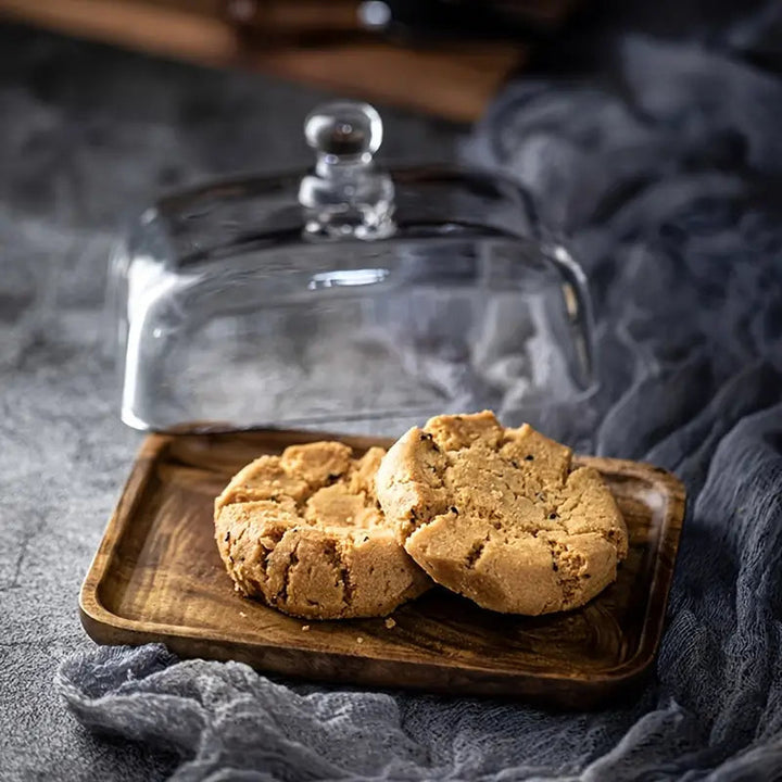 Beautiful wooden butter dish with glass cover, enhances kitchen decor & keeps butter fresh on the counter.