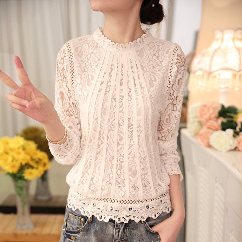Chic women's long sleeve top, Amira, featuring intricate lace & floral details. A versatile & comfortable dressy blouse.