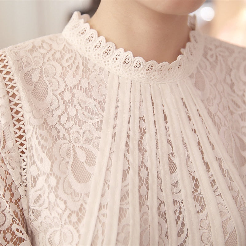 Classic Amira women's elegant lace blouse with stand-up collar and long sleeves. Ideal for sophisticated autumn style.