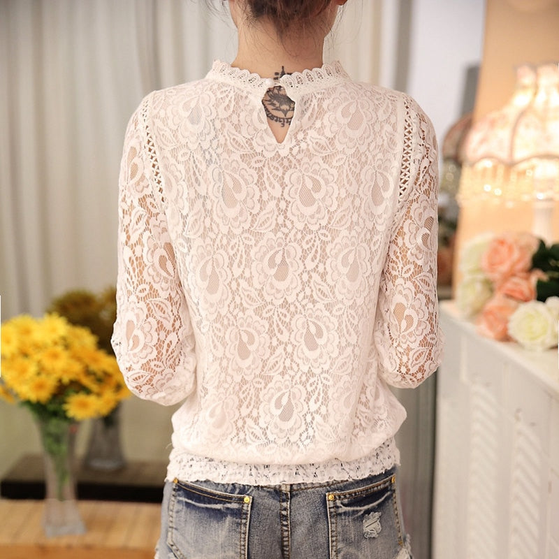 Dressy women's long sleeve floral lace blouse, Amira, showcasing an elegant design. A versatile and comfortable top.