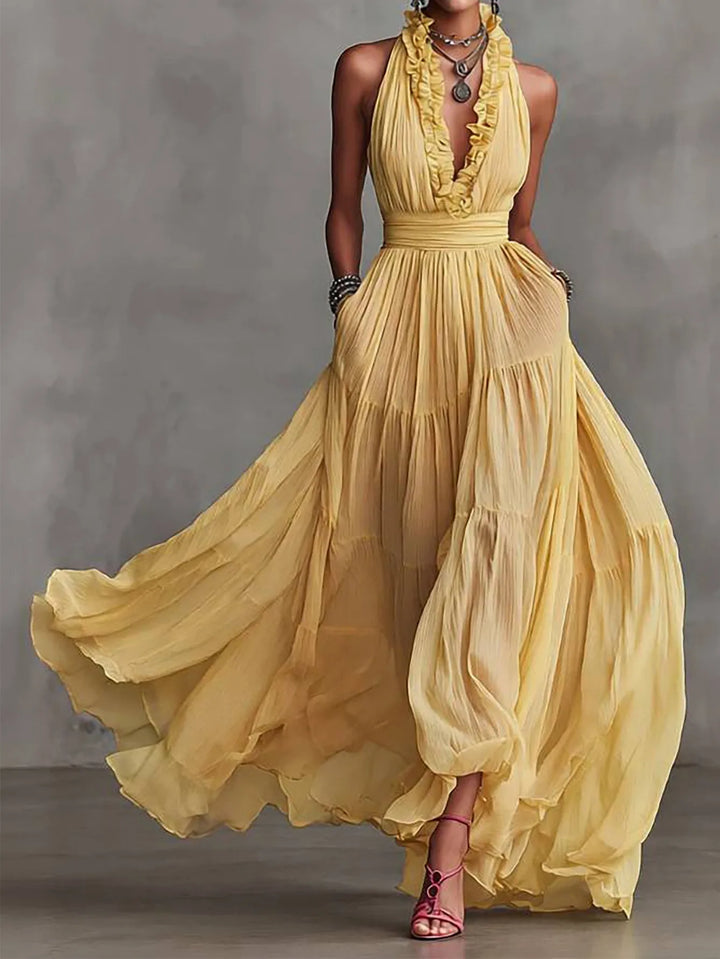 Elegant backless women's maxi dress with ruffle trim, perfect for evening parties & wedding guests.