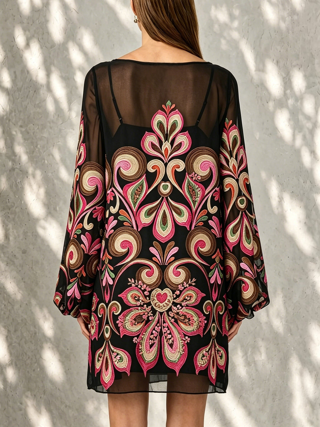Stylish women's black floral print mini dress featuring sheer balloon sleeves & elegant boat neckline.
