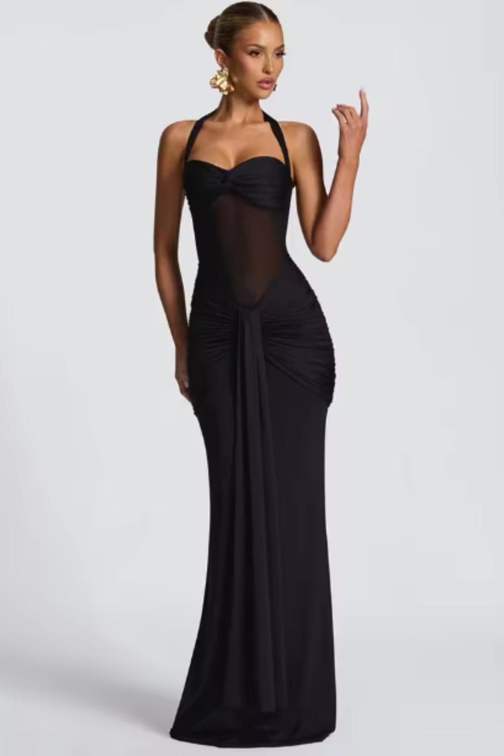 Formal women's halter neck evening gown, a chic bodycon maxi dress designed for special events.