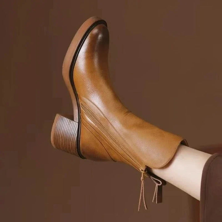 Elegant black high-heel ankle boots for women, offering sophisticated style & comfort for everyday wear.