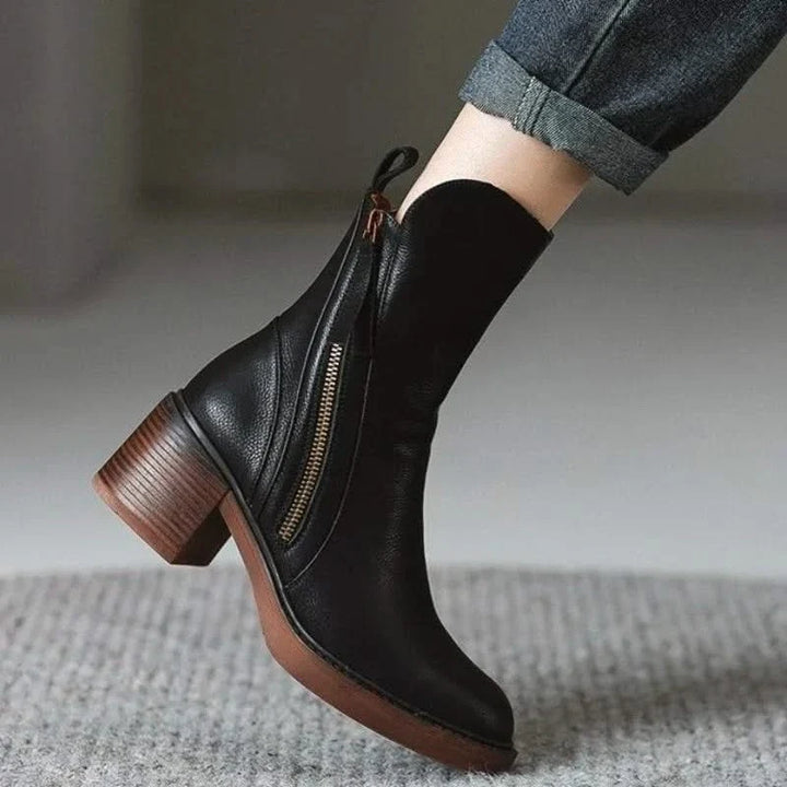 Women's elegant high-heel ankle boots, blending stylish design with comfortable sophistication for modern wear.