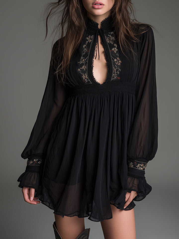 Elegant black mini dress for women featuring a stylish keyhole neckline and dramatic sheer balloon sleeves, perfect for parties.