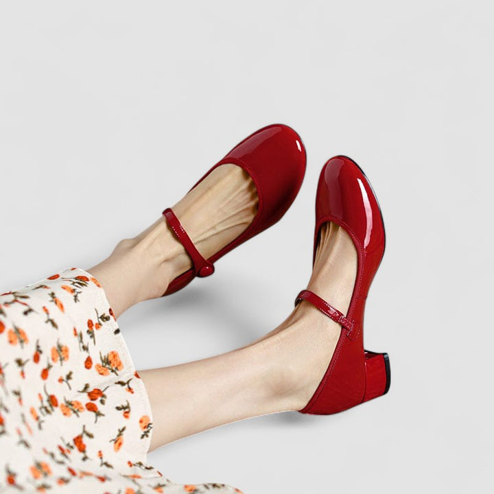 Classic patent Mary Jane block heel shoes, perfect for elegant workwear or dinner events.