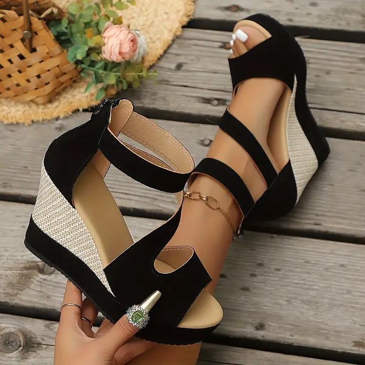 Chic women's open-toe platform wedge sandals with secure ankle strap. Ideal for versatile summer fashion.