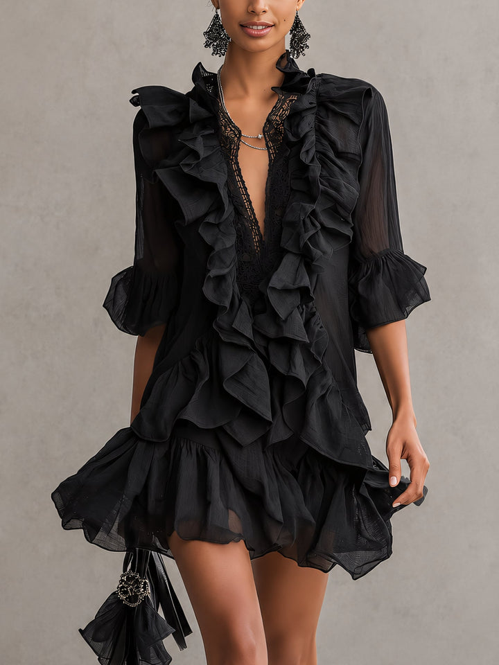Elegant black ruffle mini dress for women with sheer long sleeves & V-neck, perfect for evening parties.