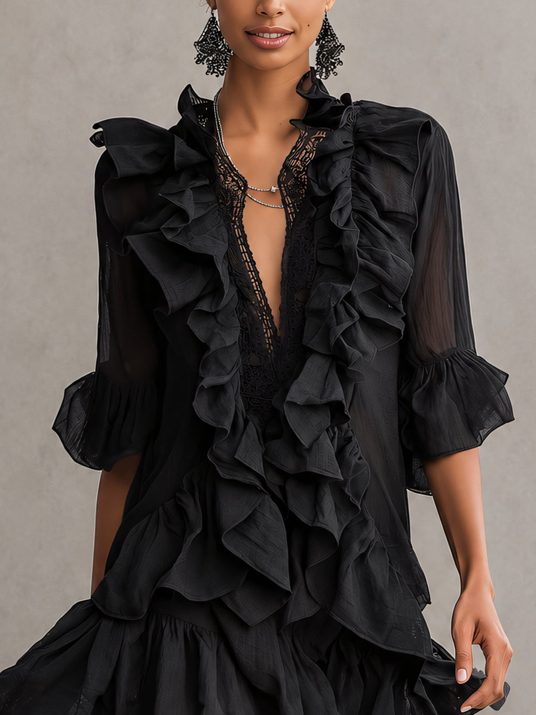 Stylish black mini dress for women with elegant sheer long sleeves and a flattering V-neck, ideal for parties.