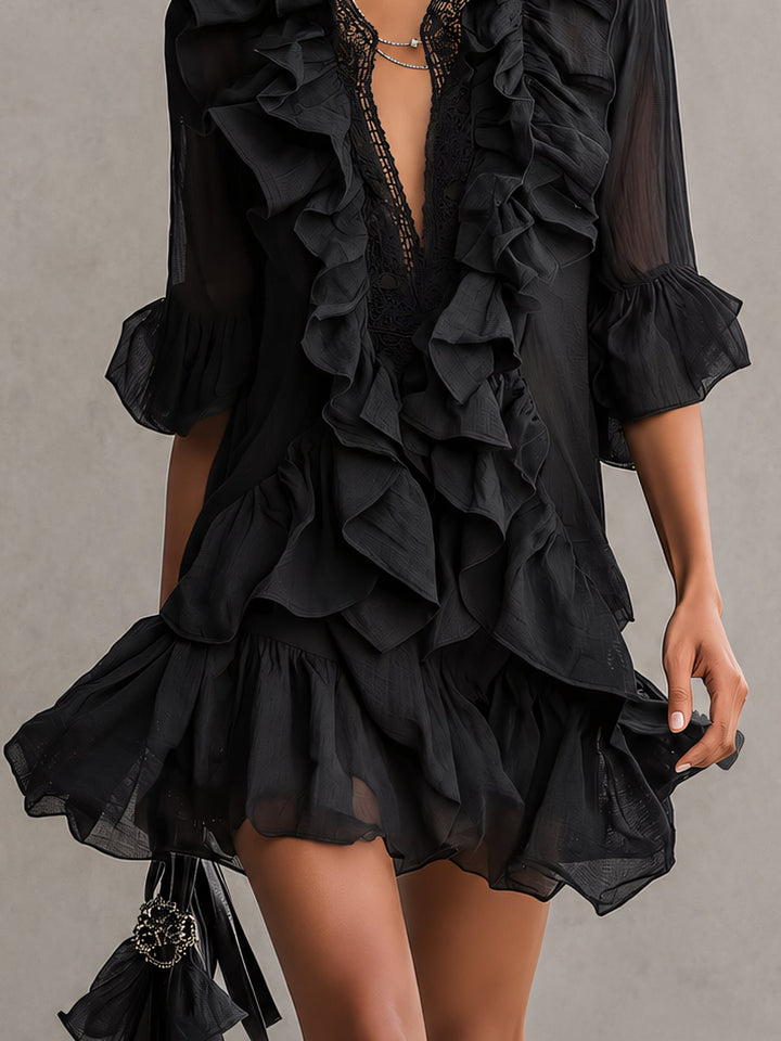 Chic black ruffle mini dress, perfect special occasion or party wear, with sheer long sleeves & elegant V-neck.
