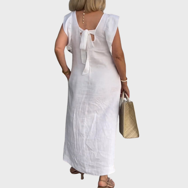 Casual women's sleeveless V-neck maxi dress with stylish ruffle shoulders and convenient side pockets.